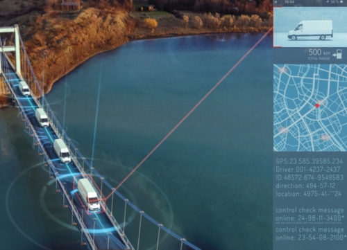 Vans cross a bridge while a fleet management company GPS tracks them